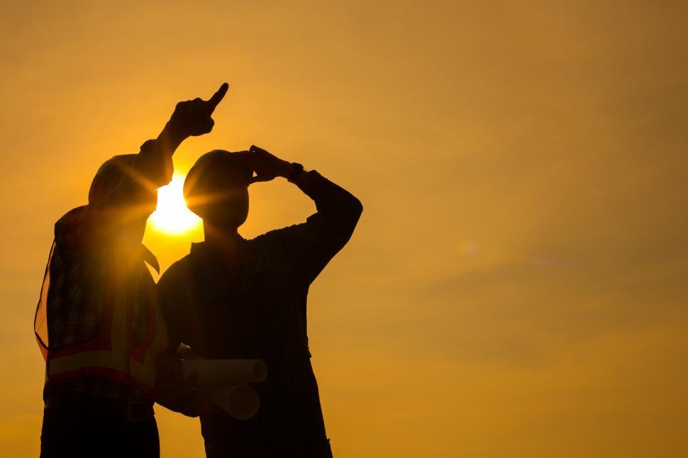 Free Image of Silhouette of young engineers 