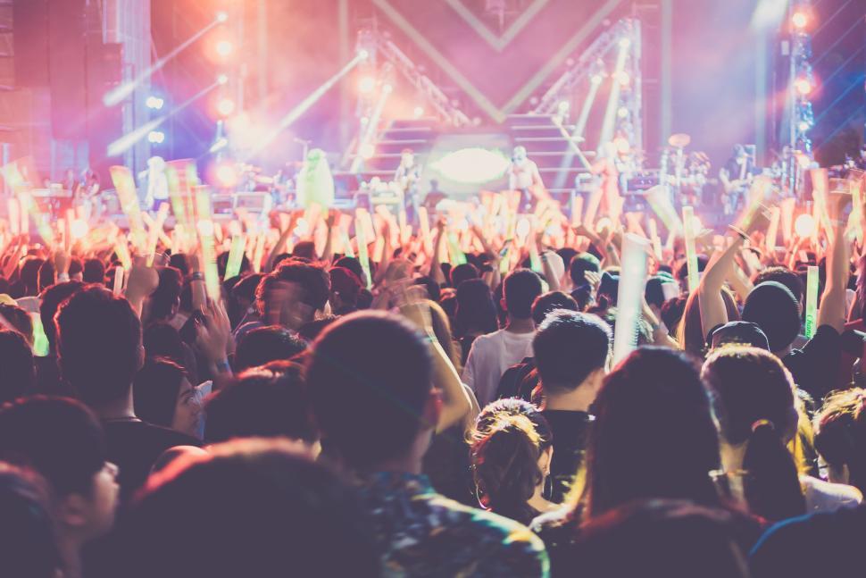 Free Image of Group of people enjoying a rock concert 