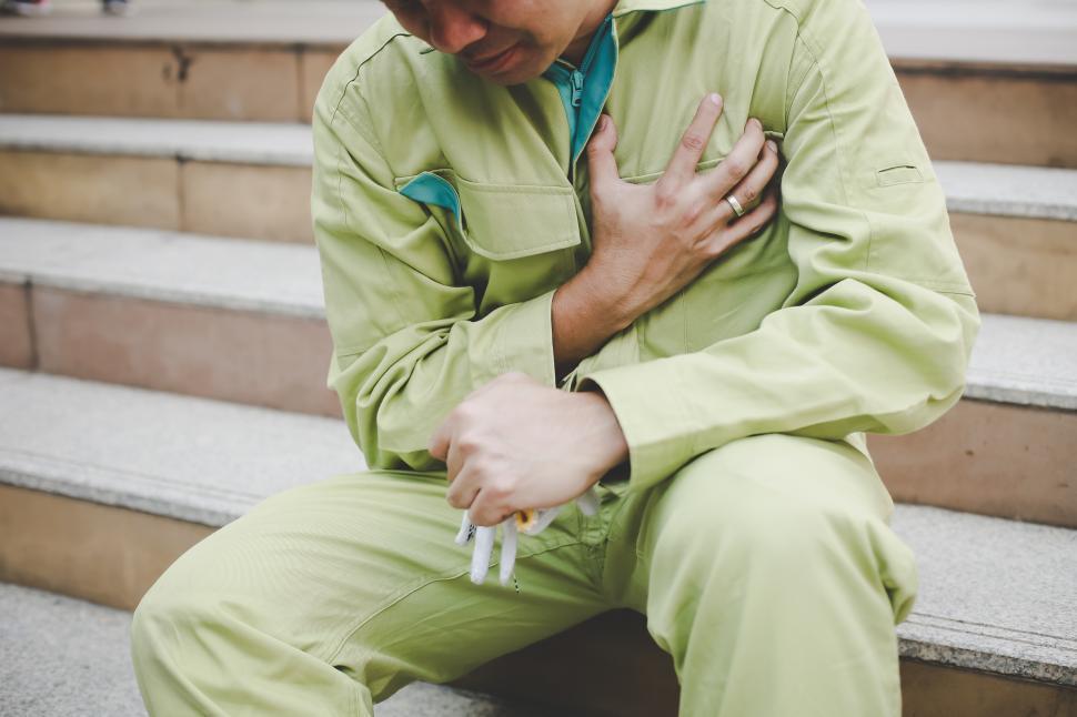 Free Image of Engineer experiencing chest pain 