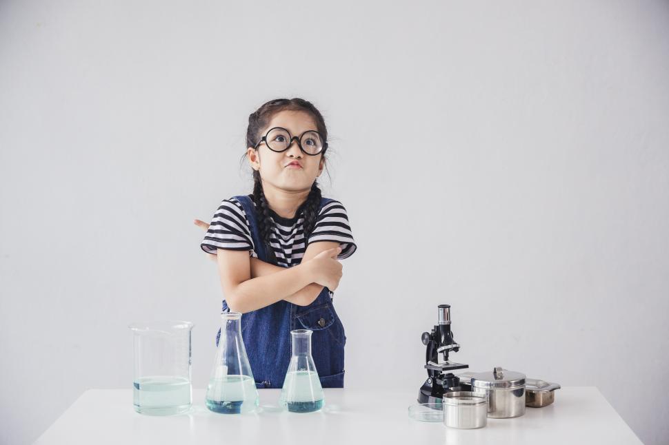 Free Image of Funny kid with chemistry equipment 