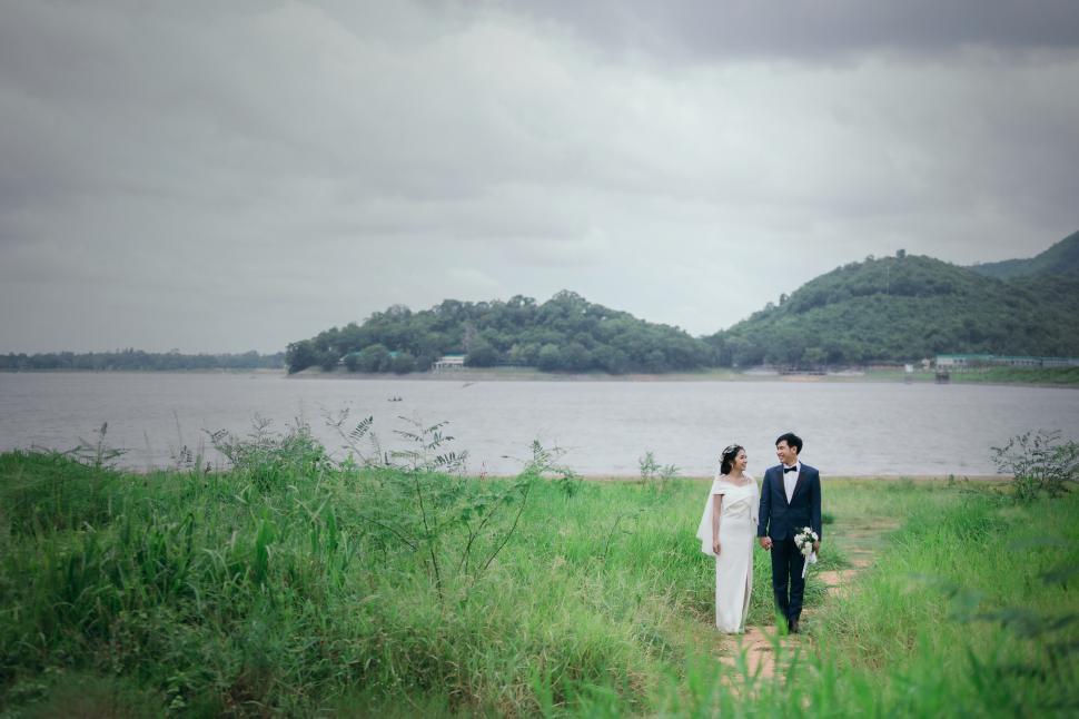Free Image of Wedding couple outdoors, Romantic and love. 