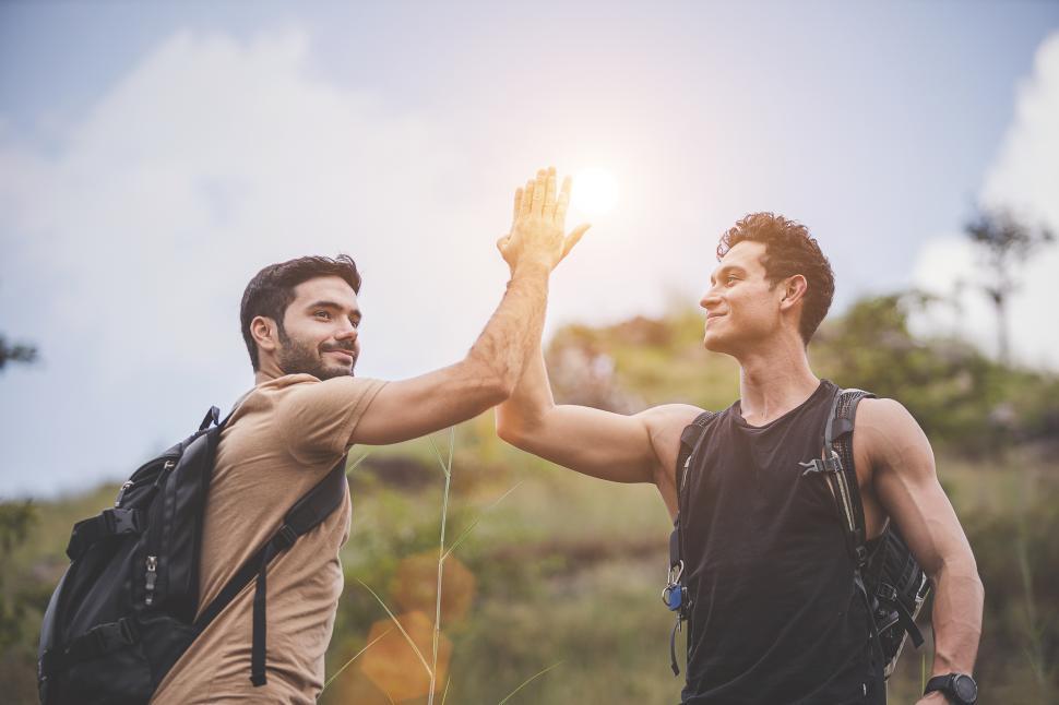 Download Free Stock Photo of Hiking high five 