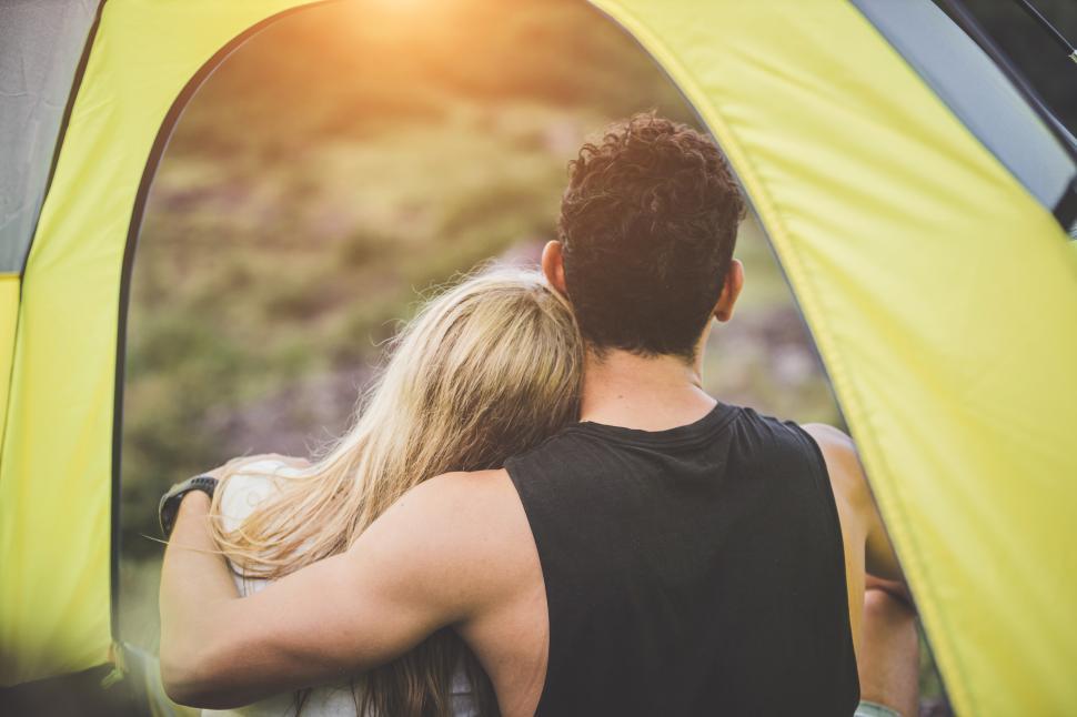 Download Free Stock Photo of Couple camping - love in the tent. 