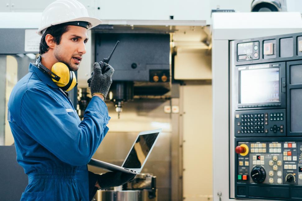 Free Image of Factory worker with walkie-talkie 