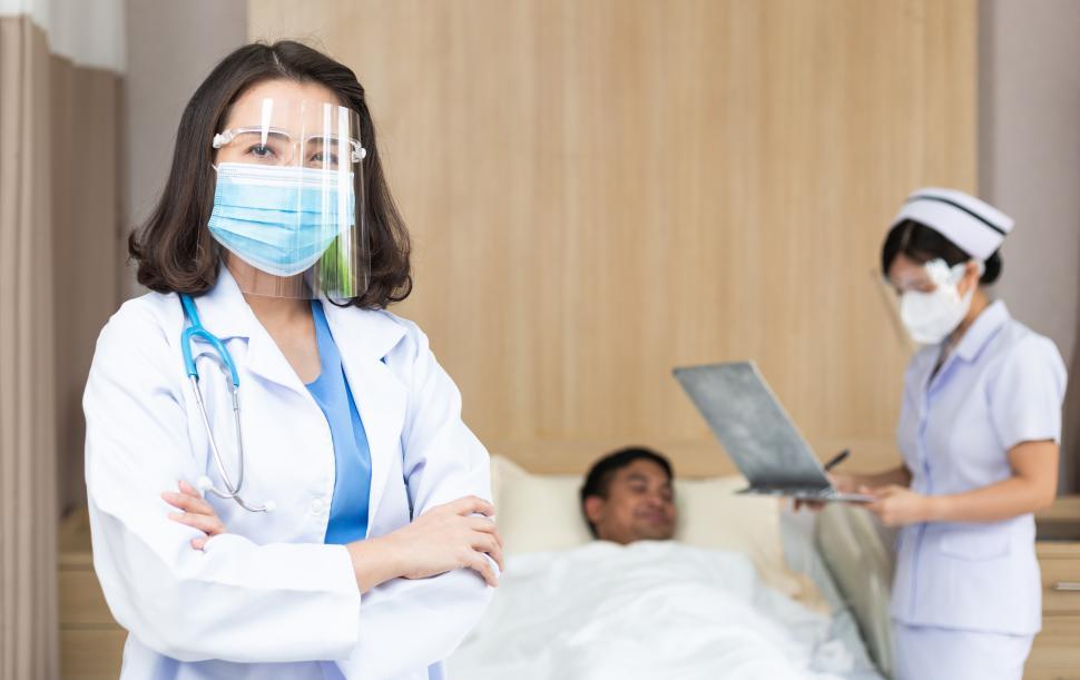 Free Image of Portrait of female doctor wearing medical protective face mask 