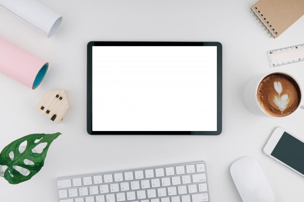 Download Free Stock Photo of Tablet mockup with blank and white screen on desk 