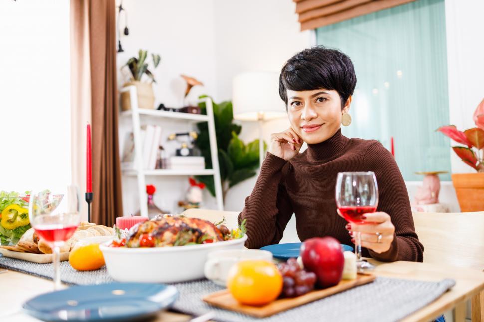 Free Image of Portrait of a confident woman dining by herself 