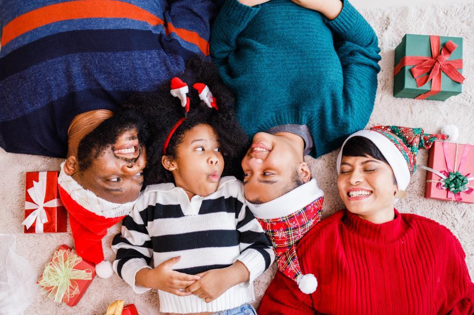 Download Free Stock Photo of Family in Christmas hats. Funny holiday family.  