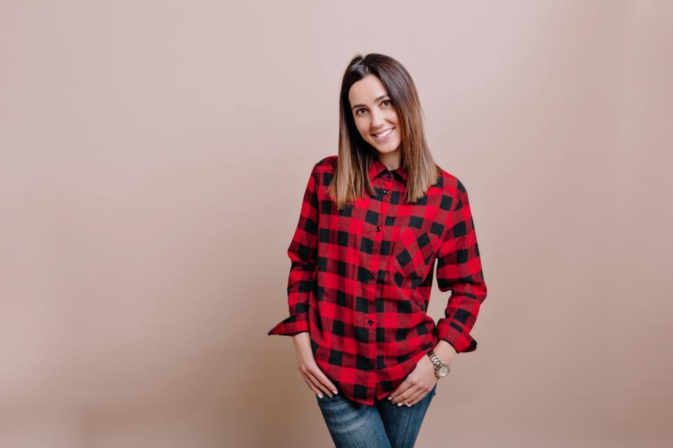 Download Free Stock Photo of Woman dressed checkered shirt and jeans 