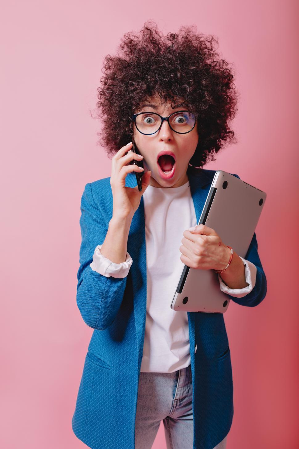 Download Free Stock Photo of Shocked woman on the phone 
