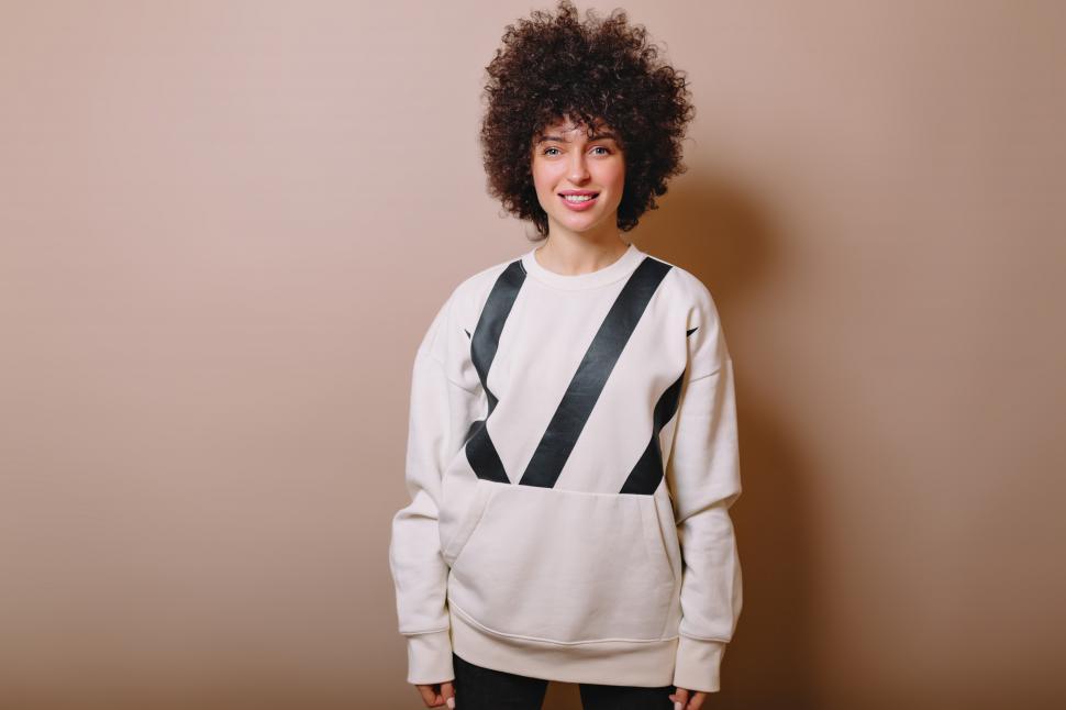 Download Free Stock Photo of Stylish adorable woman with short curly hair 