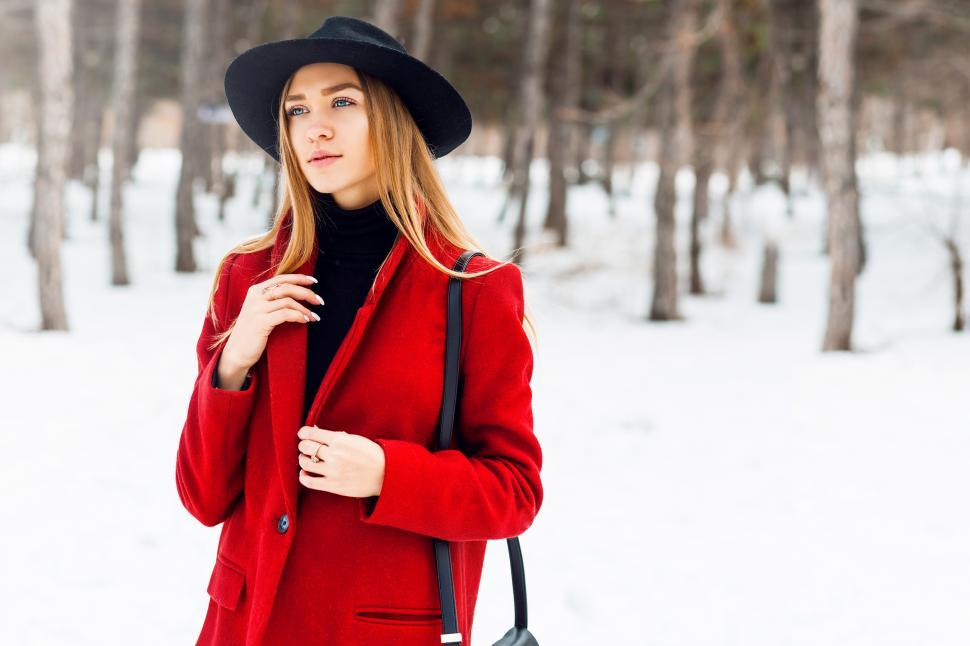 Download Free Stock Photo of Winter fashion portrait of blonde student  woman in hat and red coat 