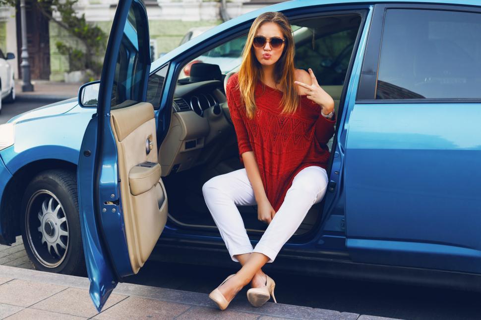 Free Image of Stylish woman in car. Successful young lady. 