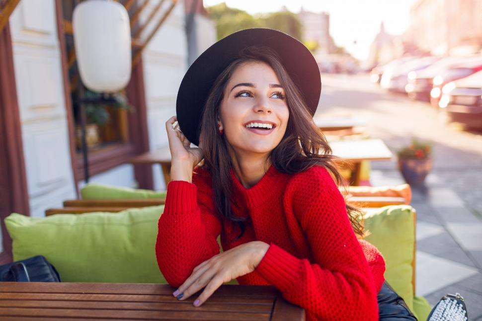 Free Image of Smiling young woman in cozy warm knitted pullover 