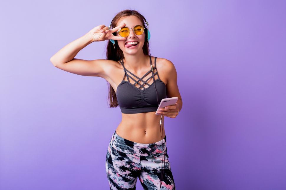 Free Image of Fit woman making faces 