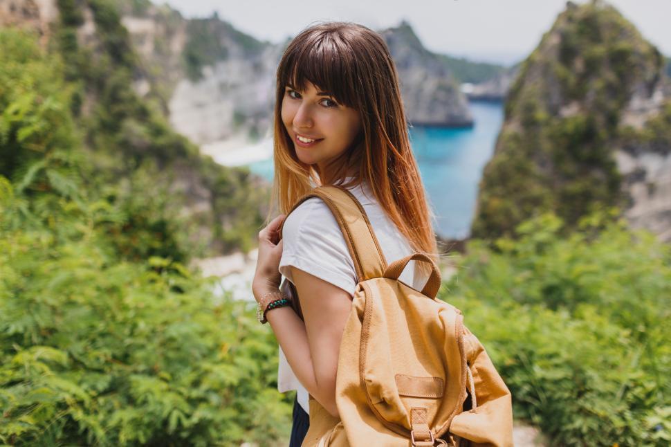 Free Image of Happy pretty woman with backpack traveling in Indonesia 