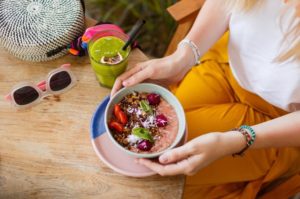 Free Image of Woman holding superfoods bowl 