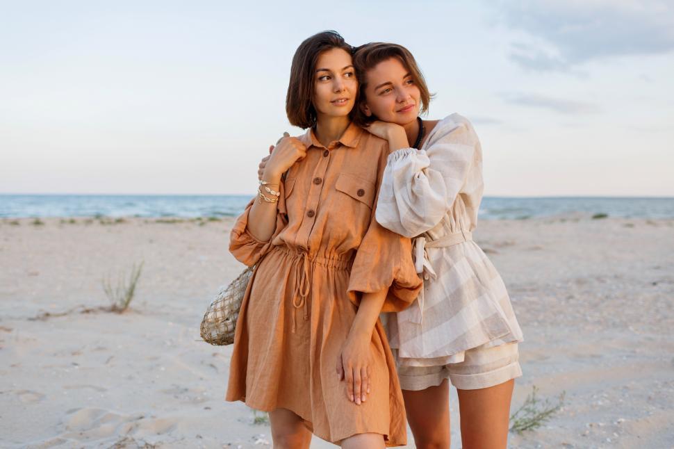 Free Image of Two brunette european women in linen clothes 