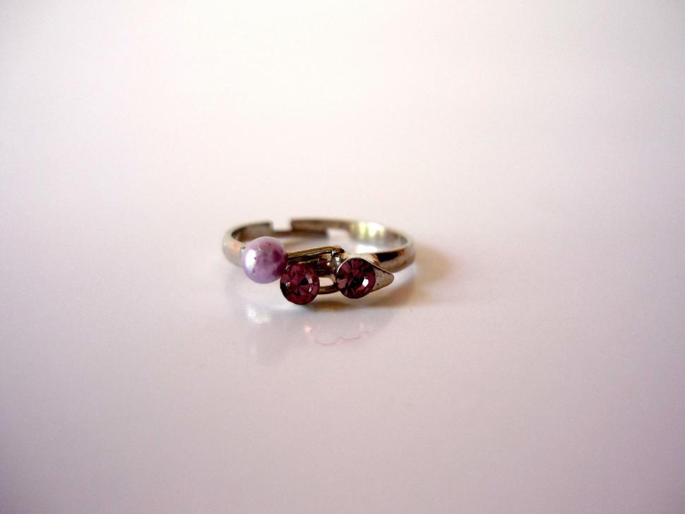 Free Image of Close Up of a Ring on White Surface 