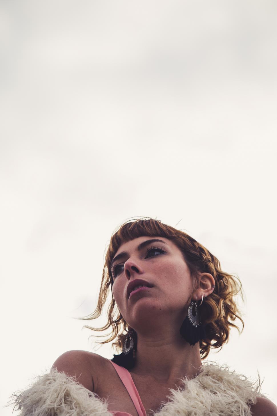 Free Image of looking up at hipster girl in an elegant dress 