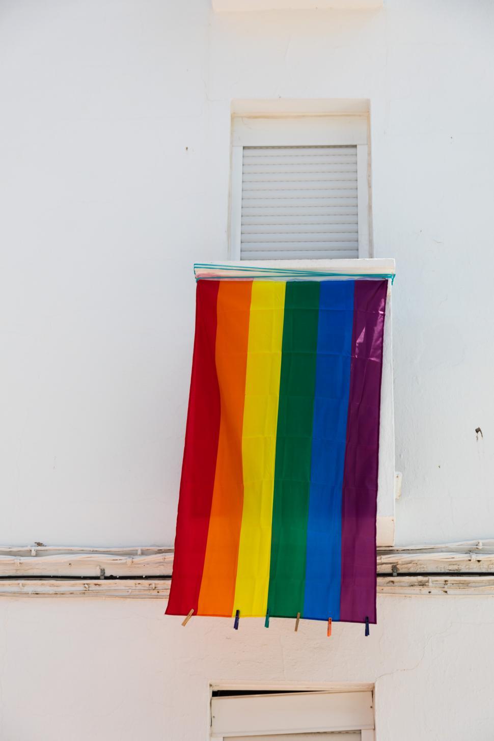 Free Image of rainbow lgtbi flag in a street 