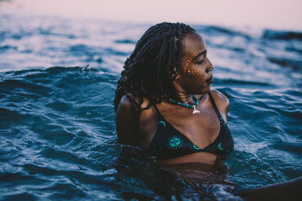 Free Image of Black woman in the water 