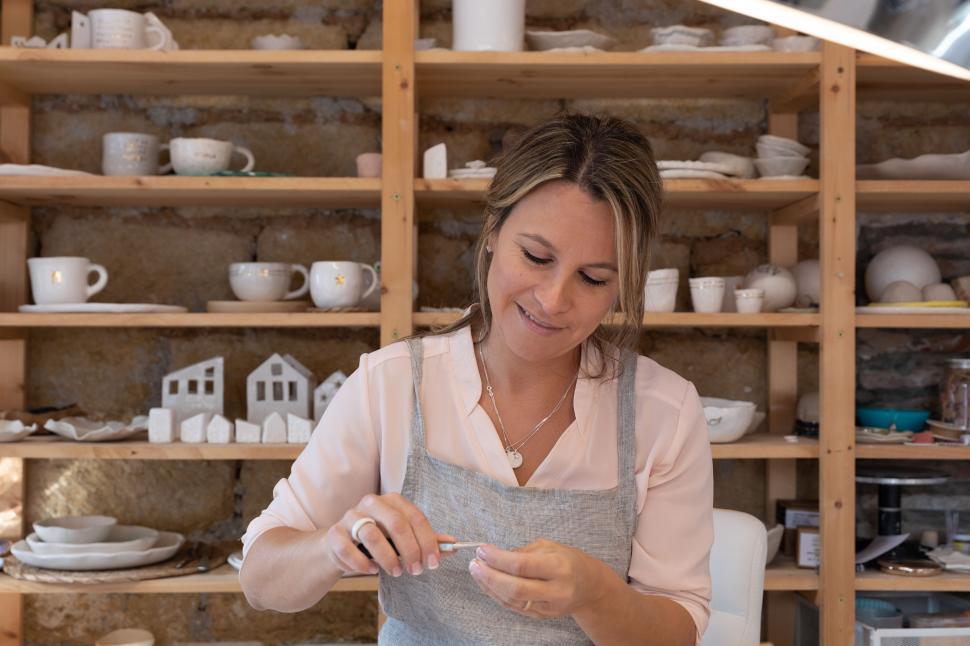 Free Image of A professional artist in her shop 