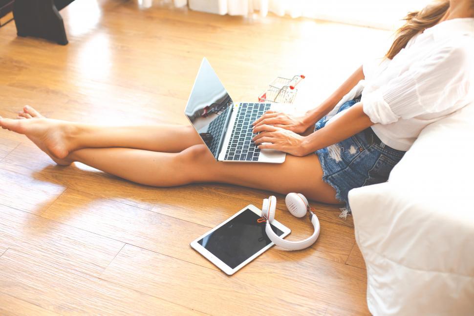 Free Image of Top view of women use laptop computer for online shopping 