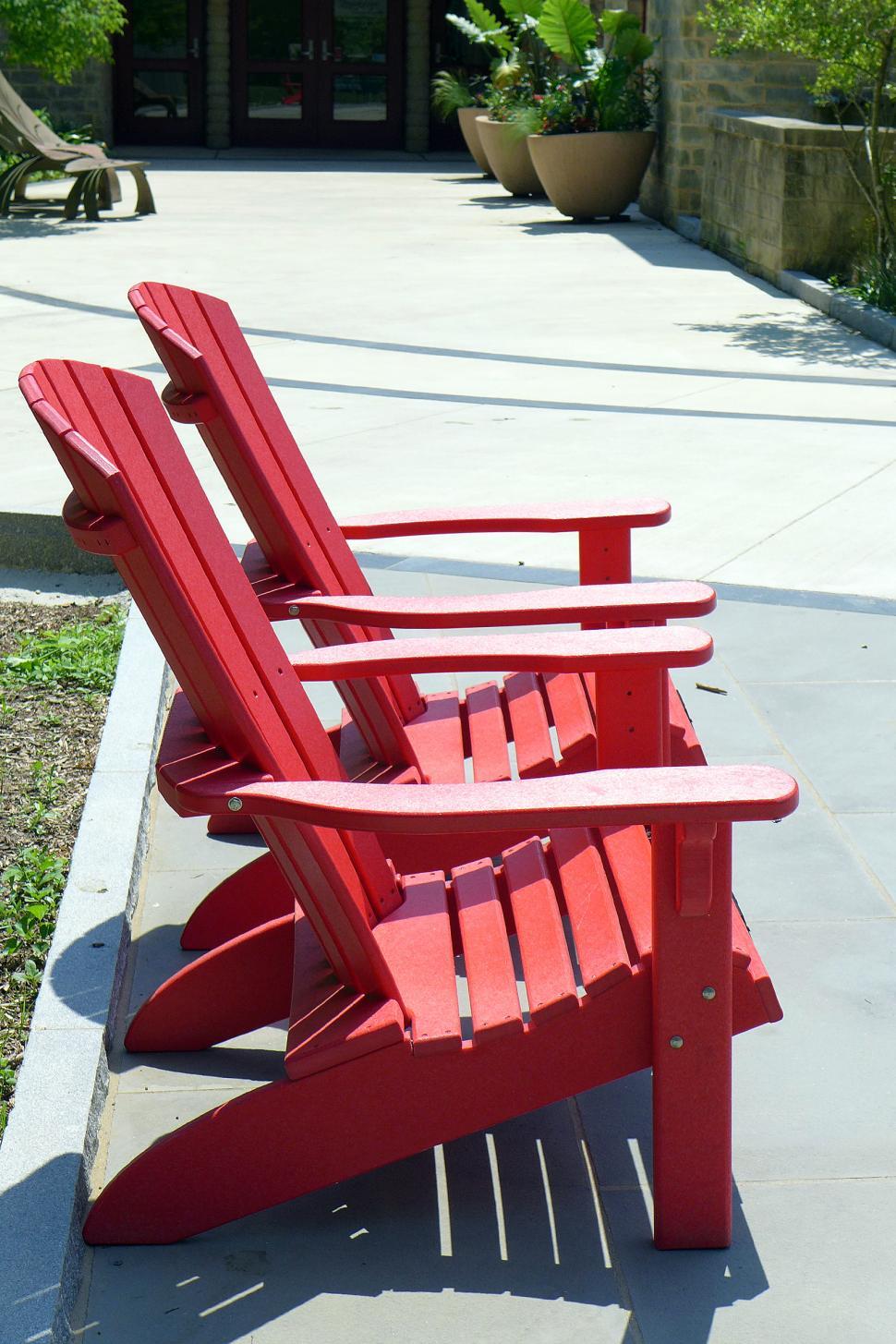 Free Image of Red Adirondack Chairs 
