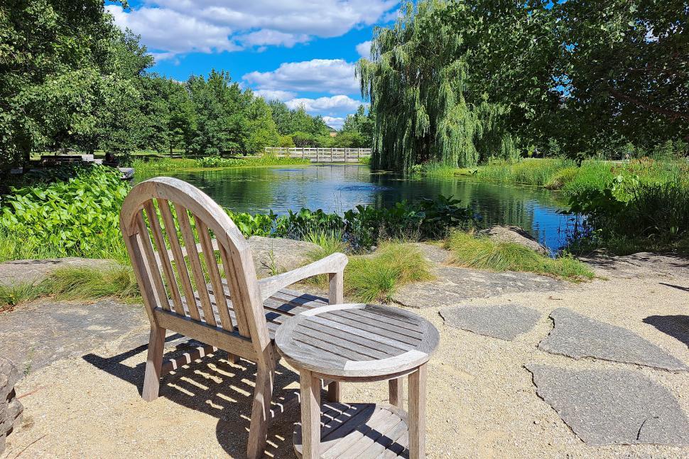 Free Image of Chair and Table By The Lake 