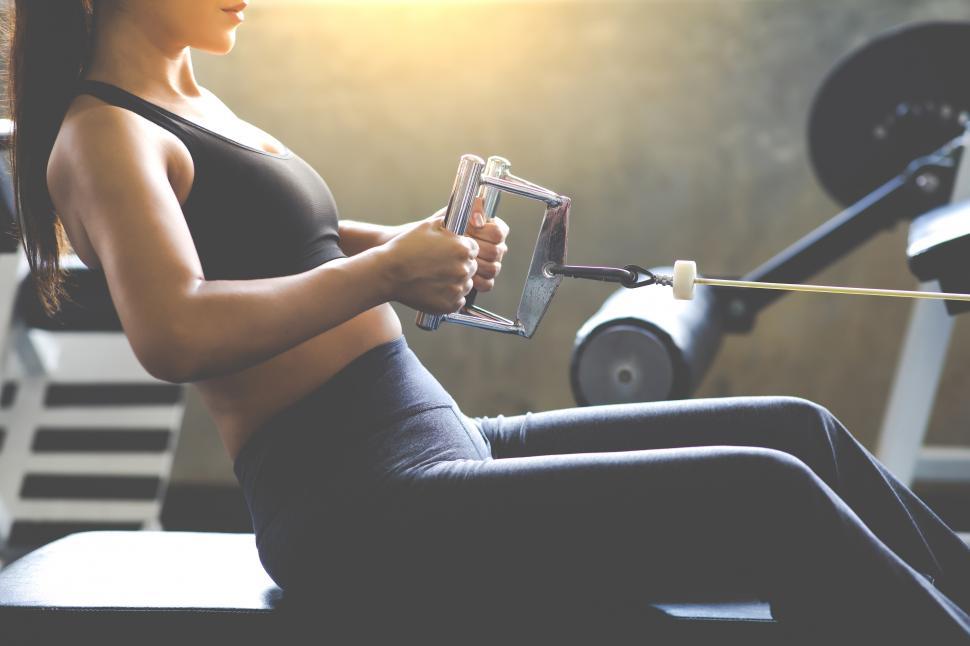 Free Image of Anonymous woman working out at the gym 