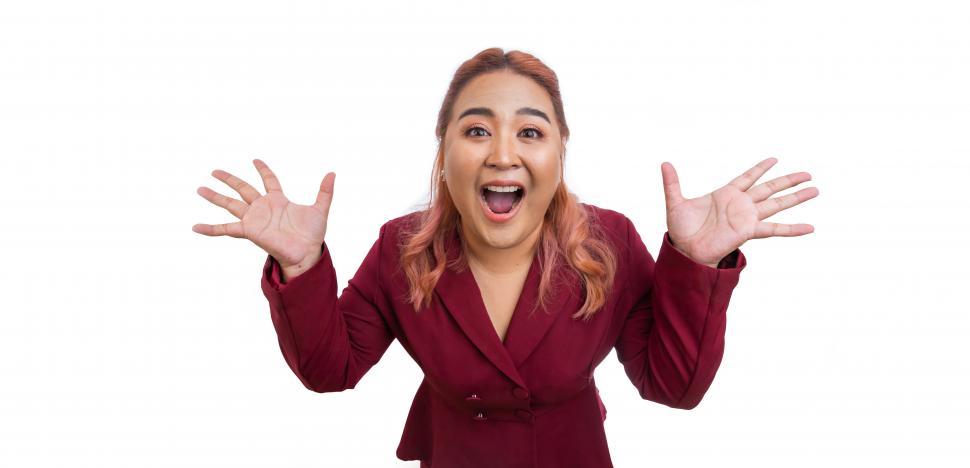 Free Image of Surprised asian woman with hands spread 