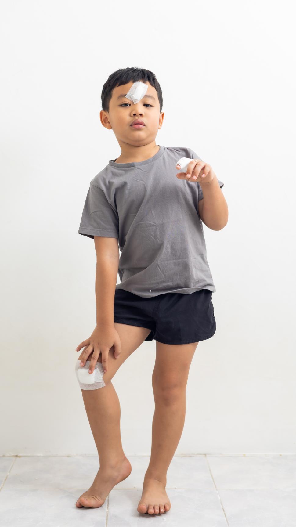 Free Image of Young boy with minor injuries 