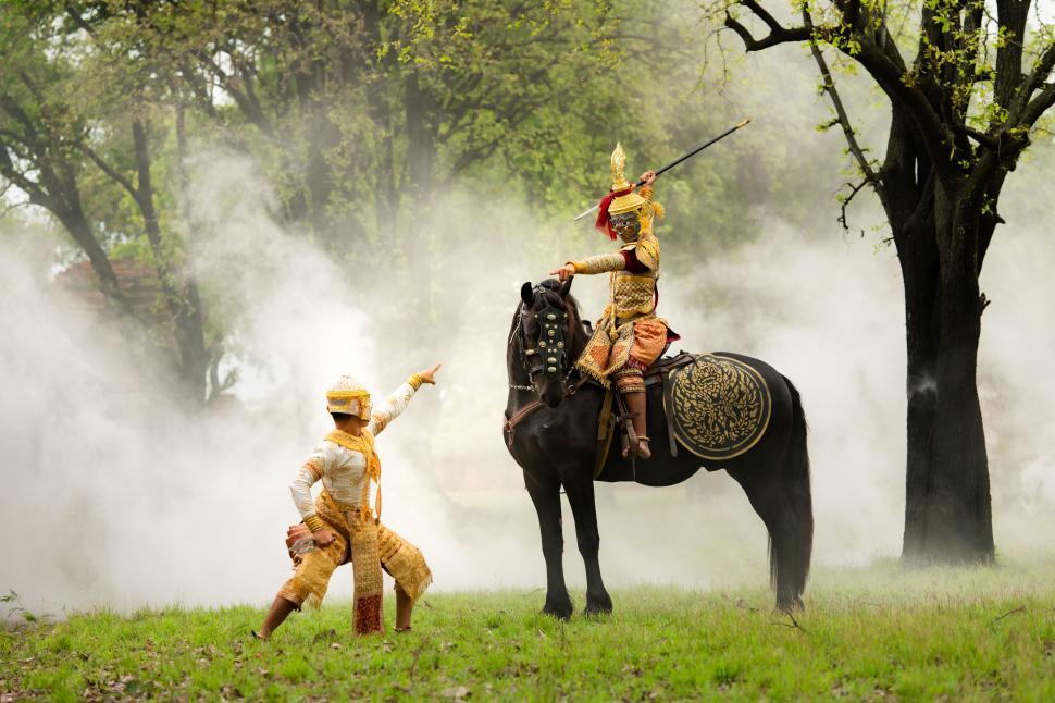 Free Image of Battle between the giant and Hanuman in Khon, a classical Thai dance in a mask. 