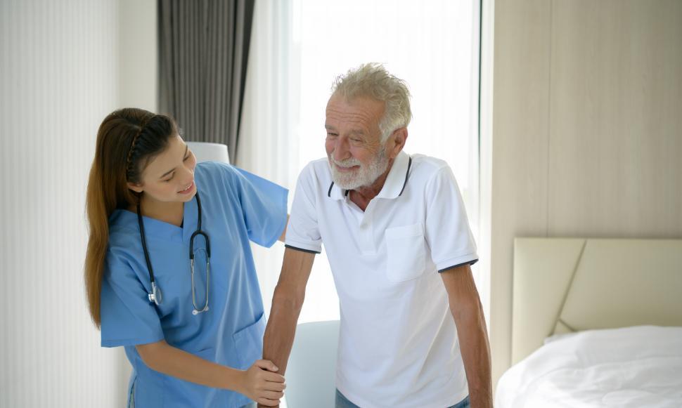 Free Image of Doctors help elderly patient with symptoms of depression 