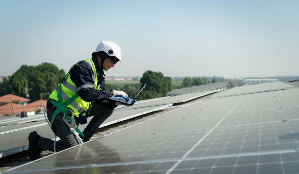 Free Image of Engineer monitoring solar panel performance - rooftop solar 