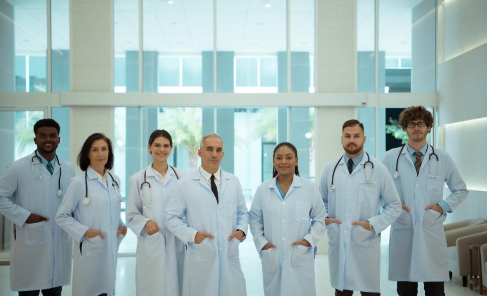 Free Image of Professional portrait of doctors and medical students posing together 