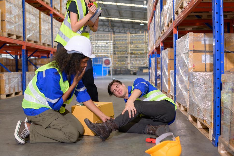 Free Image of Warehouse worker is injured on the job 