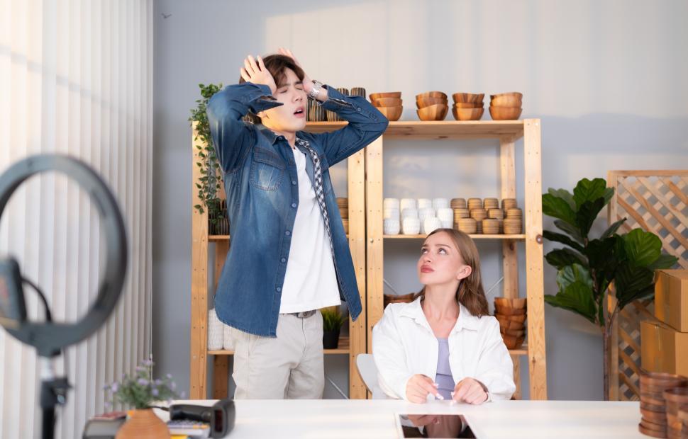 Free Image of A young couple runs a small business and the situation is dramatic 