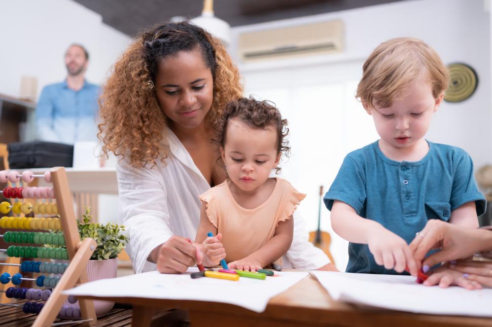 Free Image of Little kids enjoying arts and crafts activity in a group setting 