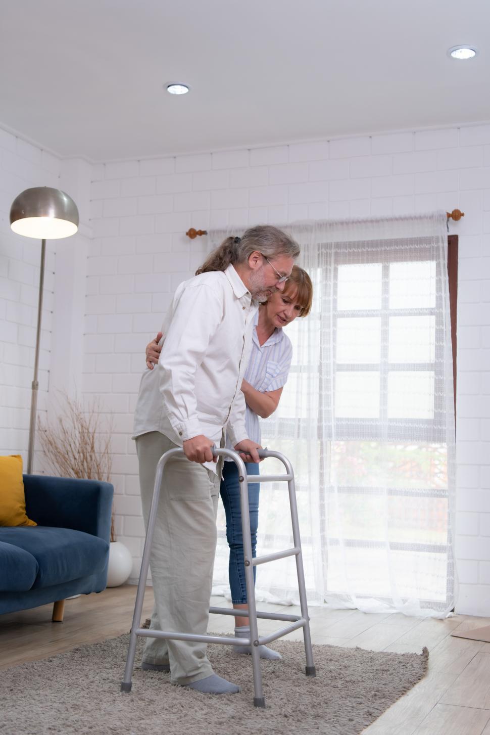 Free Image of Woman with her husband, who had to learn to walk after treatment 