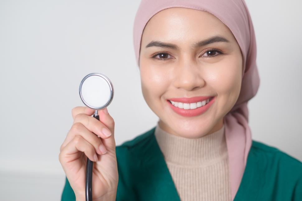Free Image of Close up of Female muslim doctor with stethoscope at office. 
