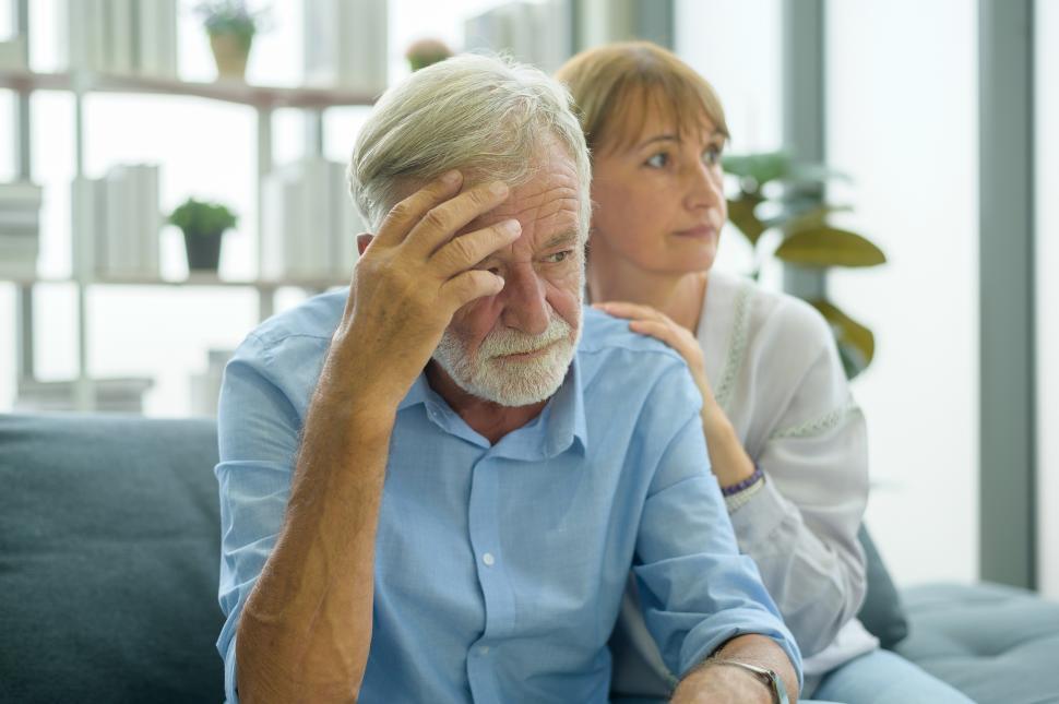 Free Image of Senior citizen is depressed or agitated, being calmed by his companion  