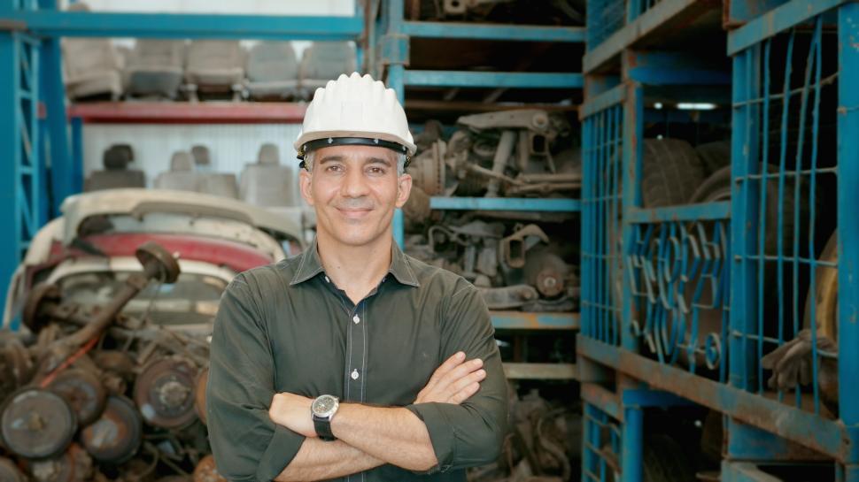 Free Image of Caucasian Engineer standing in heavy industry factory 