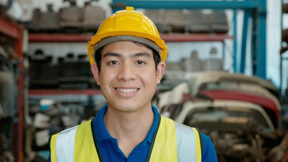Free Image of Portrait of Caucasian Engineer working in heavy industrial plant 