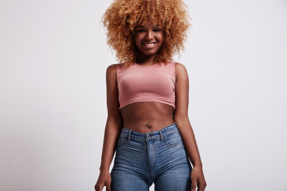 Free Image of portrait of young black woman with blonde hair and curvy body 