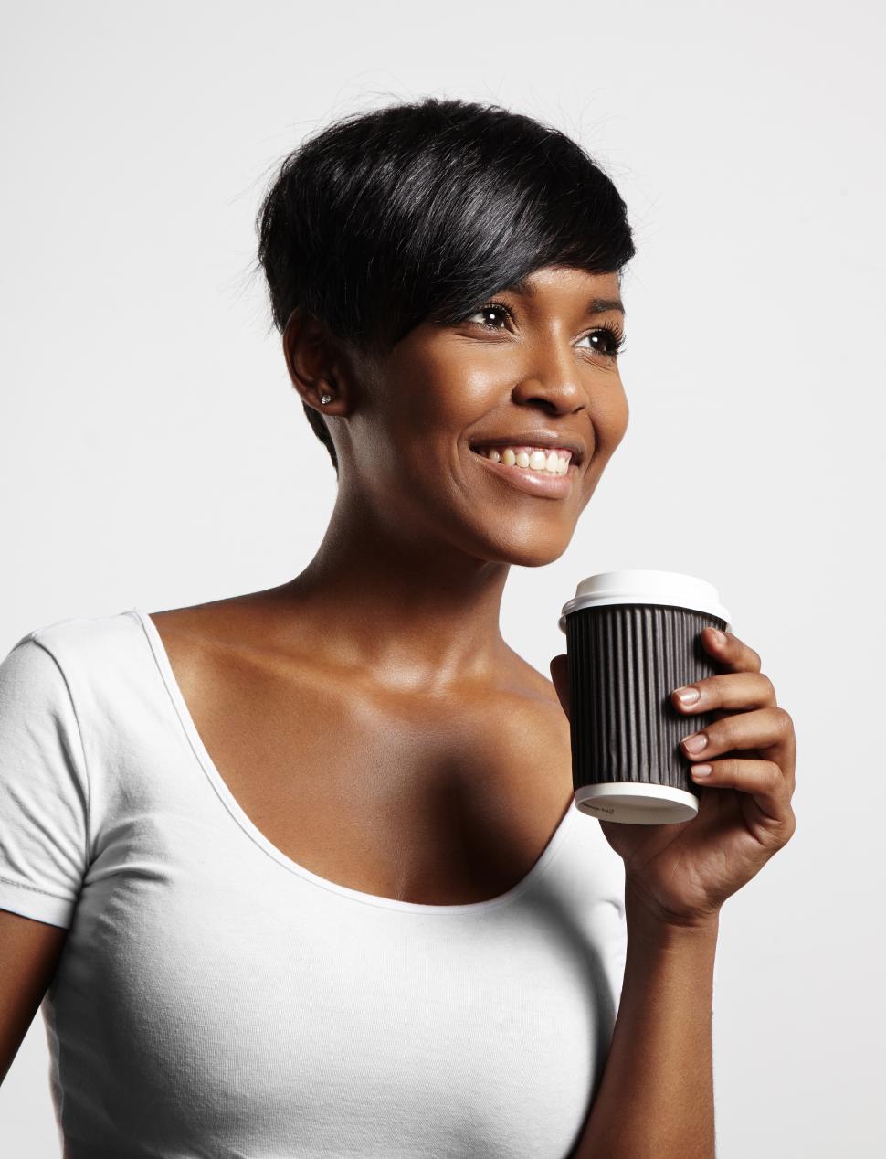 Free Image of happy woman drinking coffee 