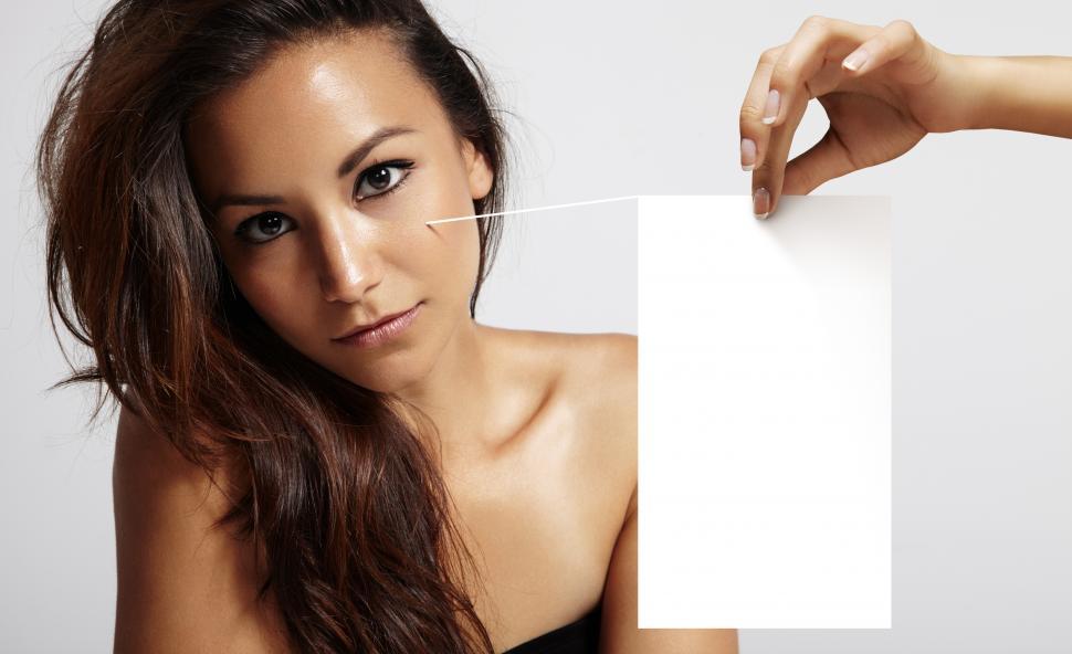 Free Image of latin woman with ideal skin and blank illustration board 