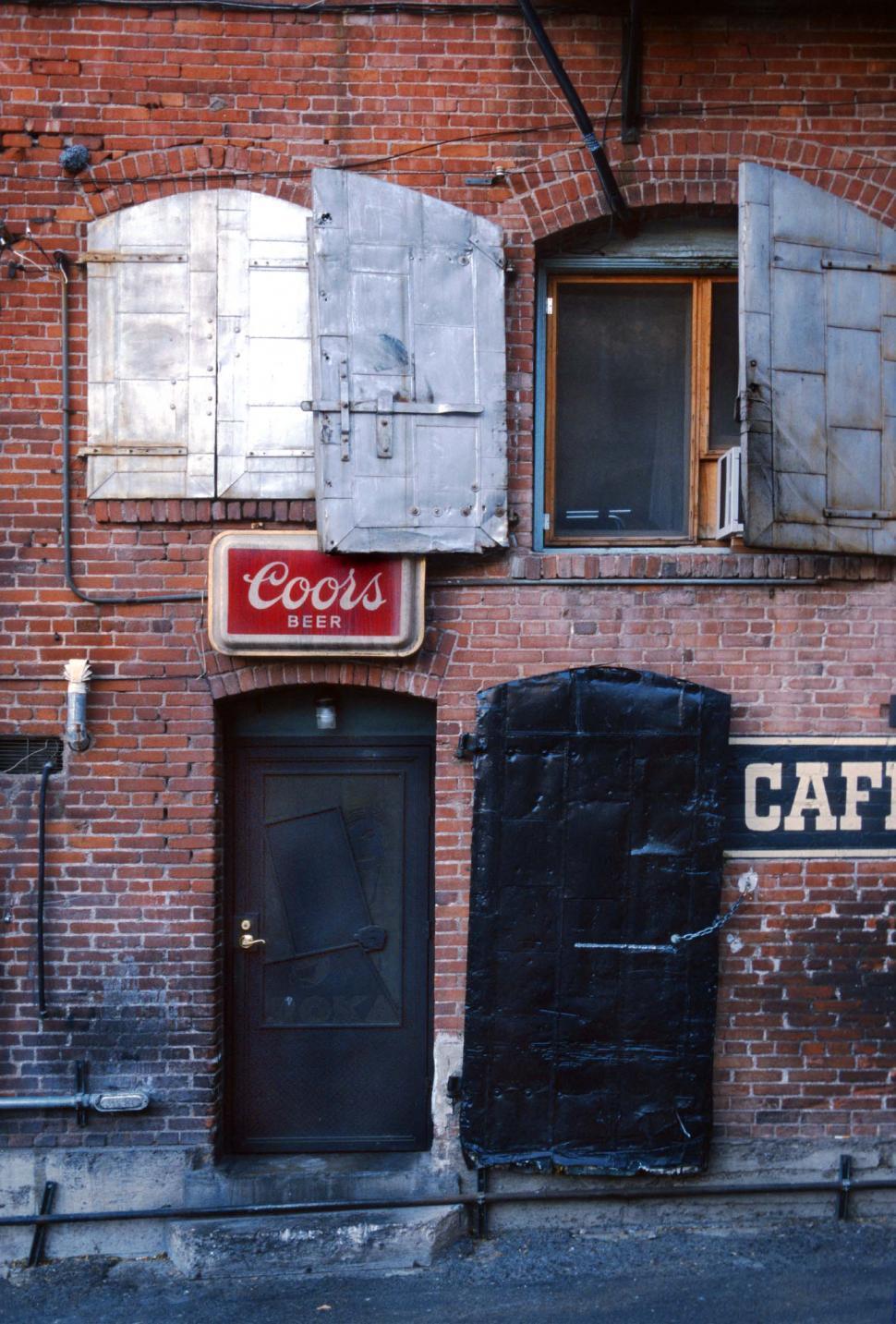 Download Free Stock Photo of Back alley behind bar - back entrance 