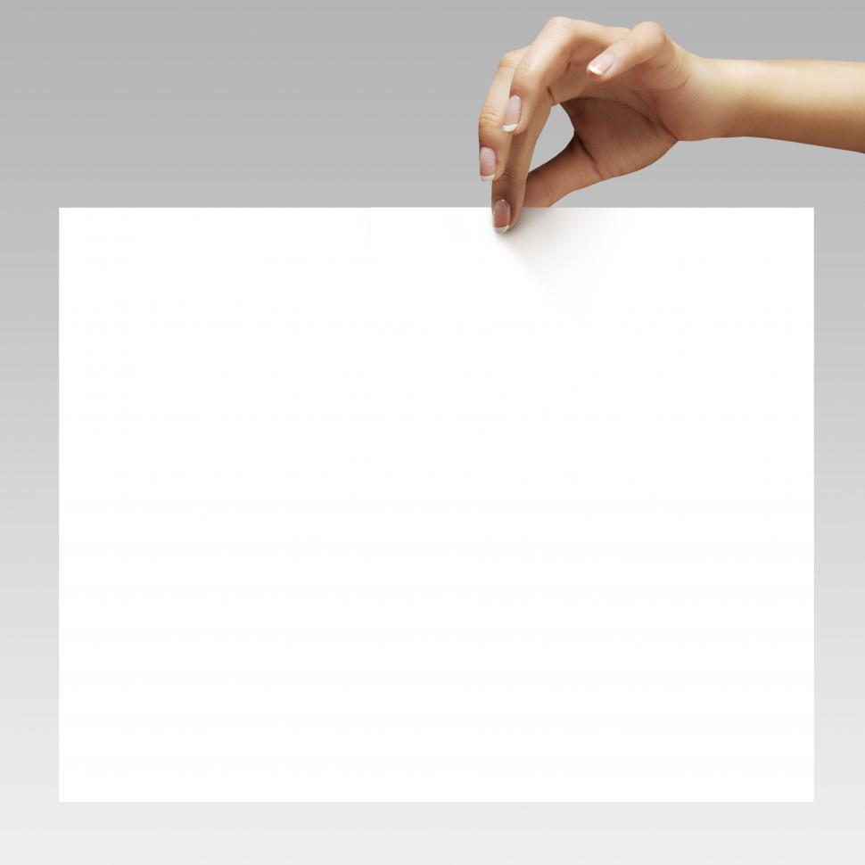 Free Image of woman hand holding the blank paper card - add your own text 